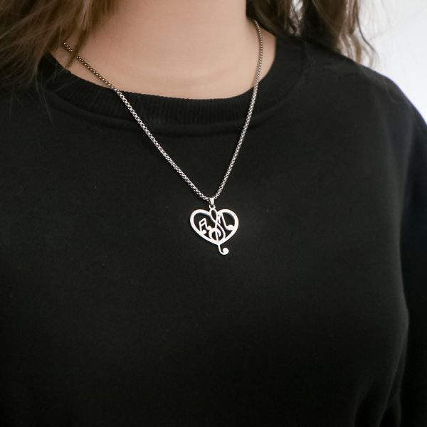 Titanium steel musical note necklace, men's heart-shaped hollow pendant, keychain, women's design sense, high aesthetic value, versatile pendant with accessories - 图片 2