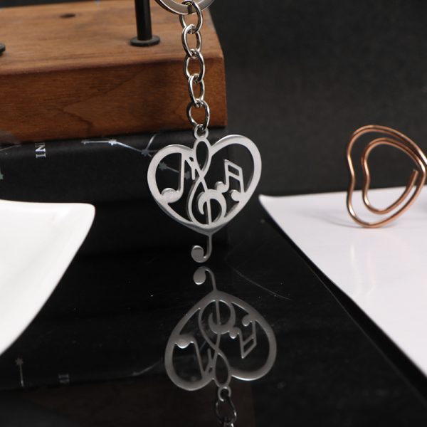 Titanium steel musical note necklace, men's heart-shaped hollow pendant, keychain, women's design sense, high aesthetic value, versatile pendant with accessories - 图片 3